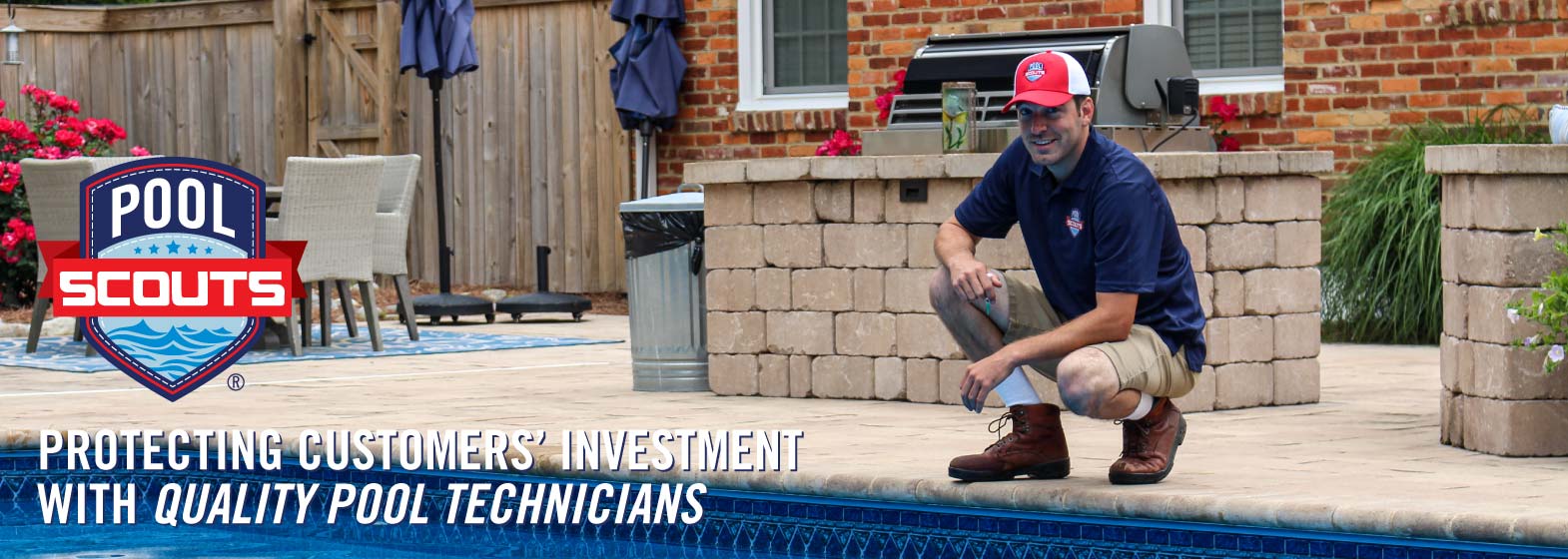 Pool technician kneeling next to a pool and smiling