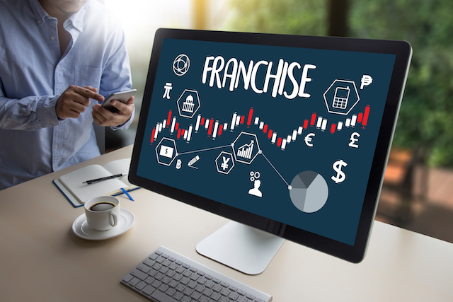 Advantages to franchising - computer with image of franchise chart