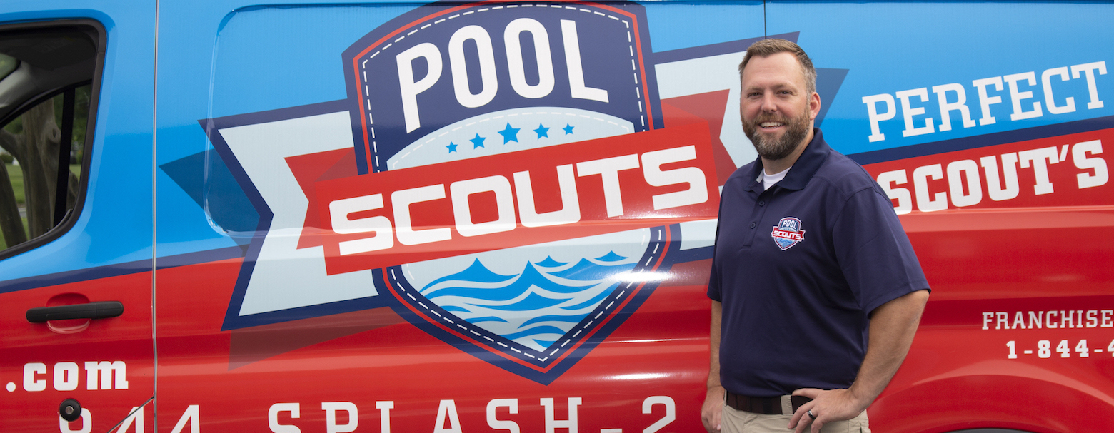 Pool Scouts owner standing in front of a Pool Scouts van and smiling